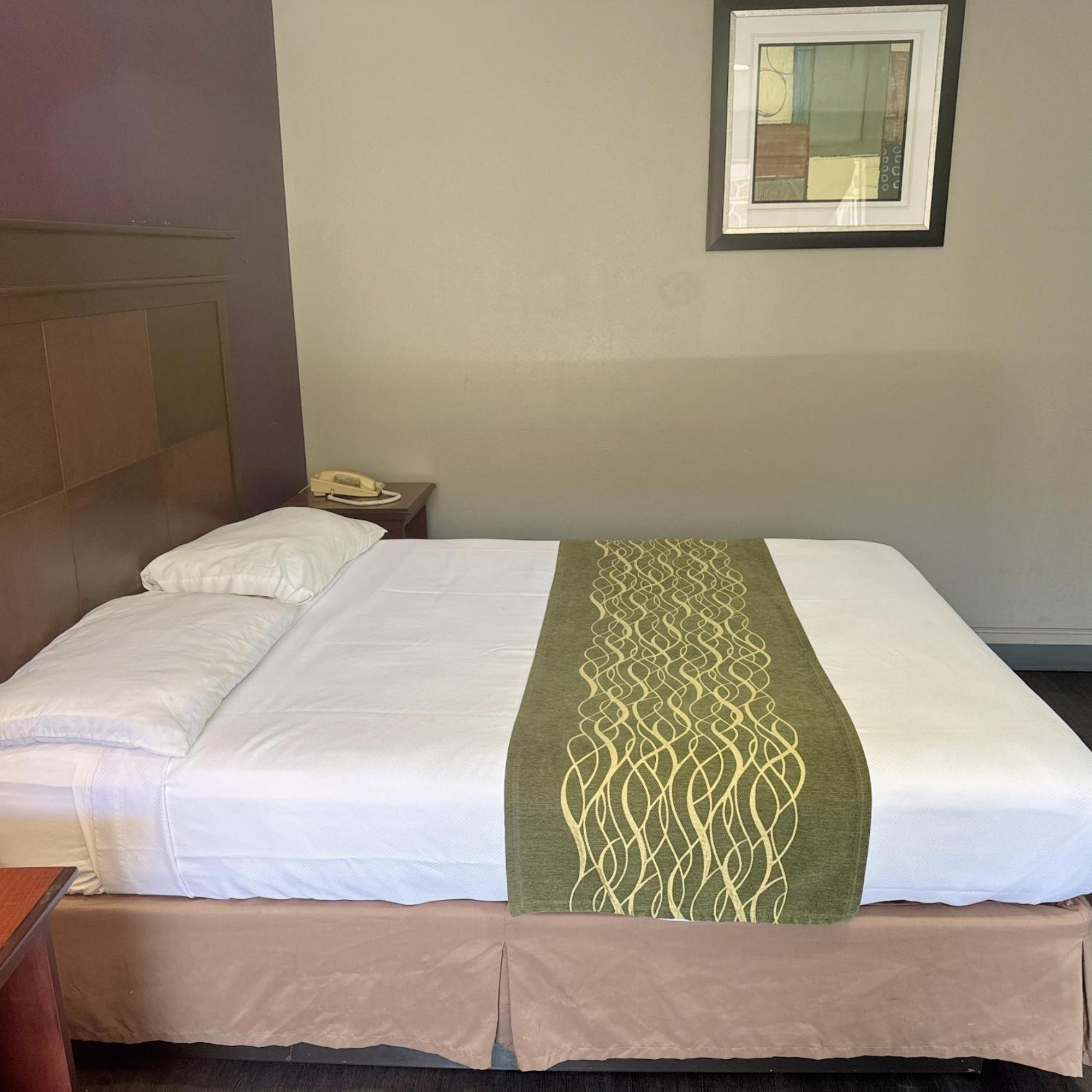 Deluxe Inn Бошьер Сити Экстерьер фото